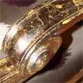 Duresta Amedeus arm detail, gold leaf over mustard yellow.